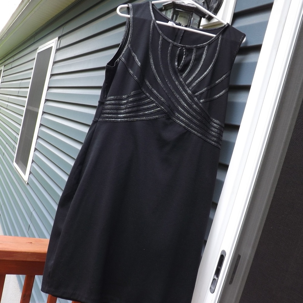 Black form fitting Studio Y dress with sparkly top